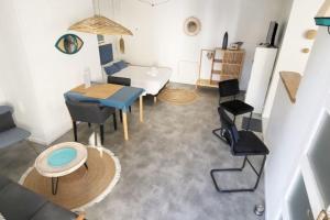 Posedenie v ubytovaní Studio Le Cosy Beach - Plage 50m - Rue gratuite