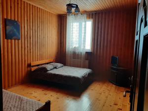 Postel nebo postele na pokoji v ubytování У Мирослави