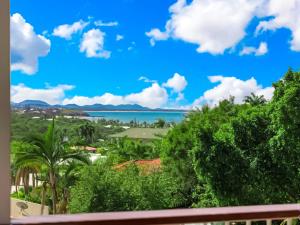 a view of the ocean from a balcony at Lammermoor Lodge Holiday Home Yeppoon in Yeppoon
