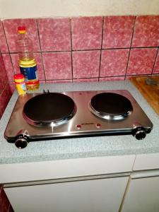 a stove top with two burners on top of it at Monteur Apartment Victoria in Hagen