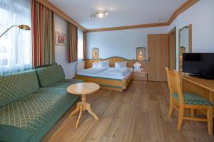 Krevet ili kreveti u jedinici u okviru objekta Hotel Gasthof Obermair