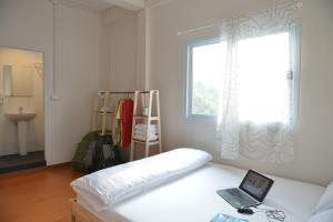 Postel nebo postele na pokoji v ubytování PanPan Hostel