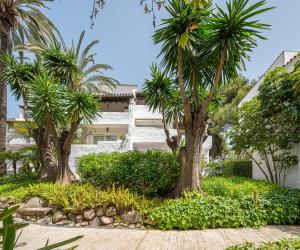A garden outside Puente Romano Hotel Apartment Marbella