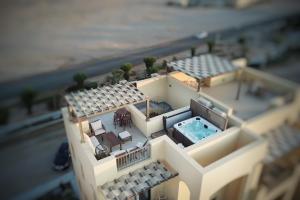 Swimmingpoolen hos eller tæt på Eclectic 2 BDR Twin House Tawila El Gouna