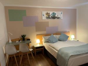 Postel nebo postele na pokoji v ubytování Residenz Hotel Wuppertal