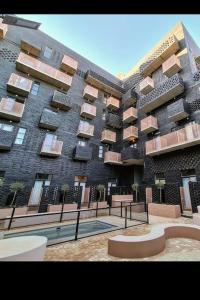 a large building with balconies on the side of it at Located in the heart of the city in Johannesburg