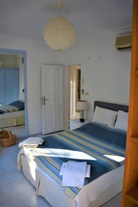 Ένα ή περισσότερα κρεβάτια σε δωμάτιο στο Stanistan Apartment