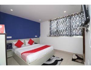 Ένα ή περισσότερα κρεβάτια σε δωμάτιο στο Hotel MDA, Lucknow