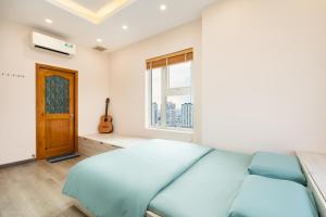Căn hộ cao cấp 3 sao quận 10 - Hong Dao House 객실 침대