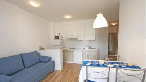 Kuchyň nebo kuchyňský kout v ubytování Jurman Apartment