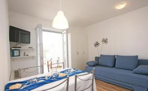 TV a/nebo společenská místnost v ubytování Jurman Apartment