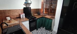 Kuchyňa alebo kuchynka v ubytovaní Private Apartament Wroniecka 6 - parking + 10 fotografií