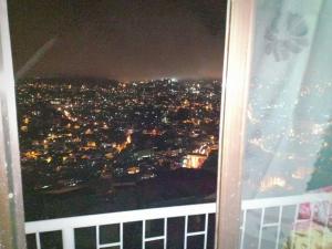 Nespecifikovaný výhled na destinaci Baguio nebo výhled na město při pohledu z apartmánu