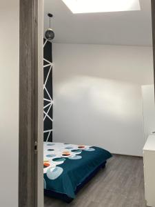 Кровать или кровати в номере Alvi Apartment Poiana Brasov