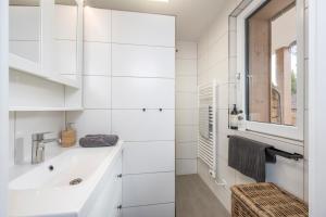 Łazienka w obiekcie JARA APARTMENT- Ramsau am Dachstein
