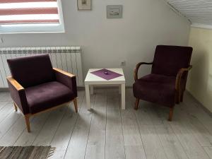 Ein Sitzbereich in der Unterkunft Apartment Dixy