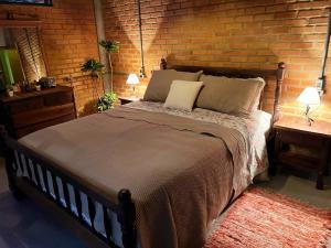 Ένα ή περισσότερα κρεβάτια σε δωμάτιο στο Chacara Morretes - Vista Fantastca Pico Marumbi