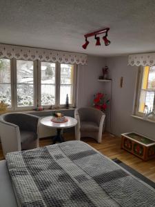 A seating area at Haus Hubertus