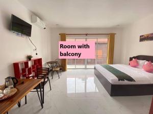 Postel nebo postele na pokoji v ubytování Khun Pich Apartments