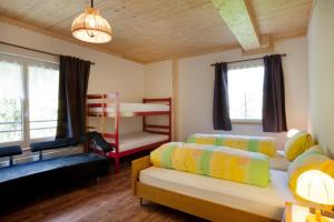 Rúm í herbergi á Hotel Gemse