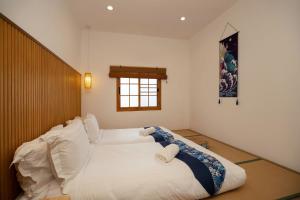 Giường trong phòng chung tại Villa Sunrise Garden B191 +33 ảnh