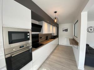 Kuchyňa alebo kuchynka v ubytovaní Magnifique appartement à deux pas du centre ville!