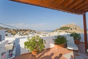 a view from the balcony of a villa at Anastasia Studios Lindos in Líndos