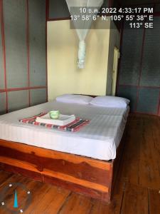 Postel nebo postele na pokoji v ubytování Pa Kha Guesthouse