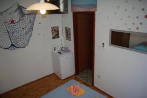 Kuchyň nebo kuchyňský kout v ubytování Rooms Tia