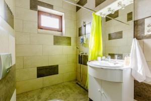 Kúpeľňa v ubytovaní Deviza Apartments + 37 fotografií