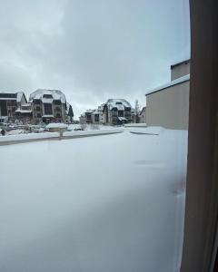 a view of a snow covered roof of a building at Milmari S50 in Kopaonik