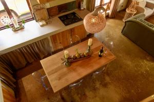 an overhead view of a wooden table in a kitchen at Giraffe Lodge in Hoedspruit