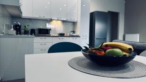 Kuchyňa alebo kuchynka v ubytovaní Hodos Luxury APT near ATH-Airport