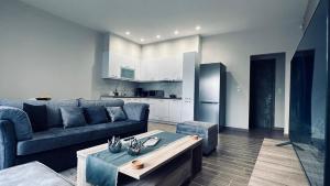 Posedenie v ubytovaní Hodos Luxury APT near ATH-Airport