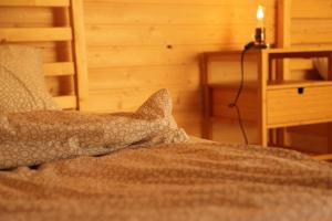 Łóżko lub łóżka w pokoju w obiekcie Farkaskútvölgy