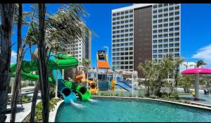 a water park with a water slide in a park at Salinas Premiun Resort Vista Mar ap1604 in Salinópolis