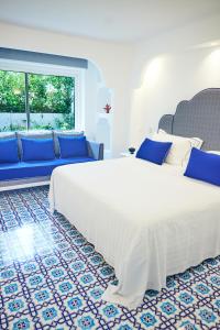 Postel nebo postele na pokoji v ubytování Oleandri Resort Paestum