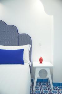Postel nebo postele na pokoji v ubytování Oleandri Resort Paestum