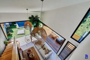 an overhead view of a living room with a chandelier at Le ti coin l'ombraz in Saint-Pierre