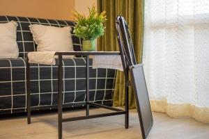 Posteľ alebo postele v izbe v ubytovaní BENALBEACH PLAYA SUITE