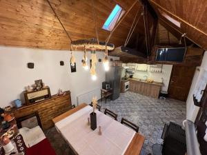 an overhead view of a dining room and kitchen at Haus Ingrid Cisnadioara in Cisnădioara