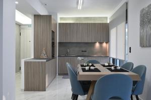 A kitchen or kitchenette at The Lop Athens Holidays Luxury Suites
