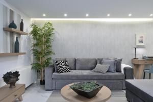 A seating area at The Lop Athens Holidays Luxury Suites