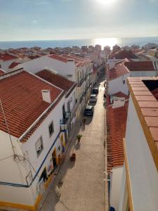 an aerial view of a city with buildings at Casas dos Avós in Nazaré