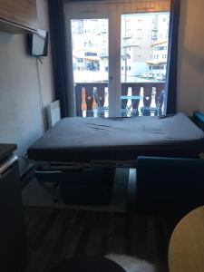 Postel nebo postele na pokoji v ubytování Studio 1 cabine chalet club III refait à neuf