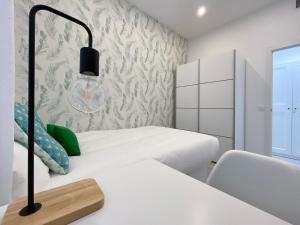 Łóżko lub łóżka w pokoju w obiekcie Batuecas Plaza Castilla - 4 dormitorios