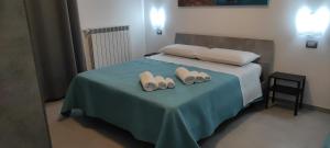 Ліжко або ліжка в номері Colline del sole