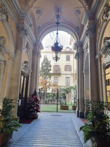 an archway with a building in the background at Stupenda mansarda in centro a Torino in Turin