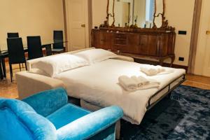 מיטה או מיטות בחדר ב-[Private Parking] centro storico: l'affresco