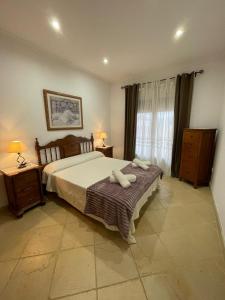 A bed or beds in a room at Casa Gonzalez
